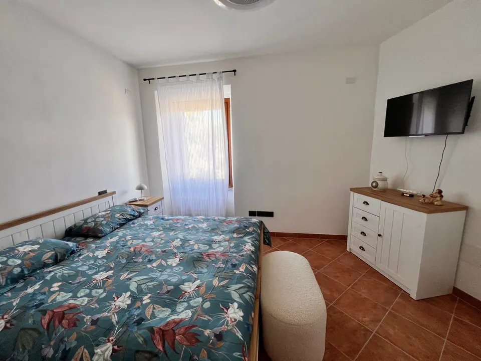 Camera - Dettaglio. Camera da letto dell'appartamento Casa Nausicaa a Costasavina, Pergine Valsugana