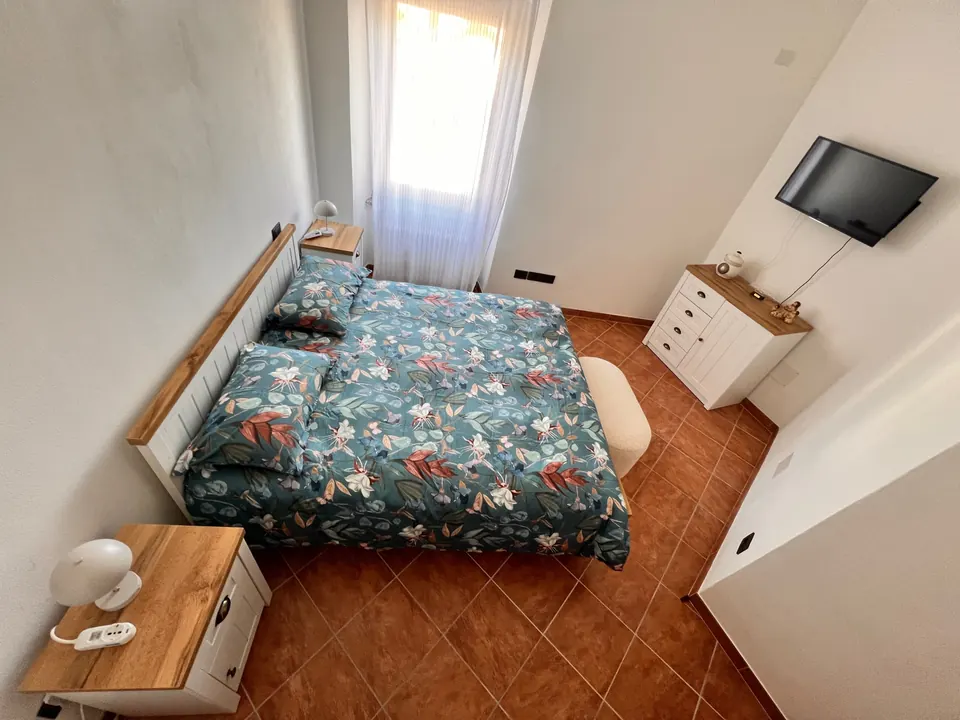 Camera da letto dell'appartamento Casa Nausicaa a Costasavina, Pergine Valsugana